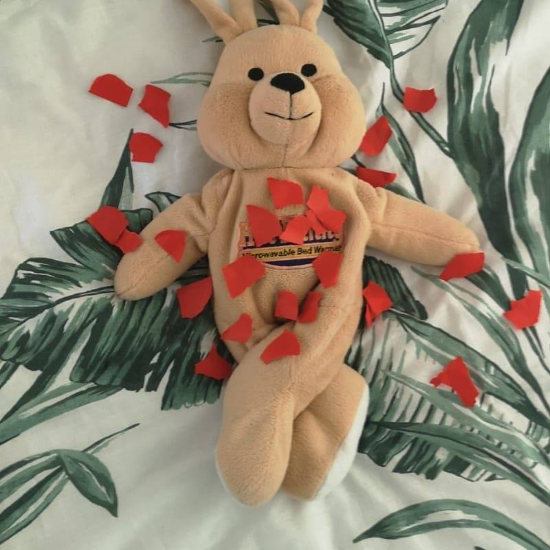 bunny toy with rose petals